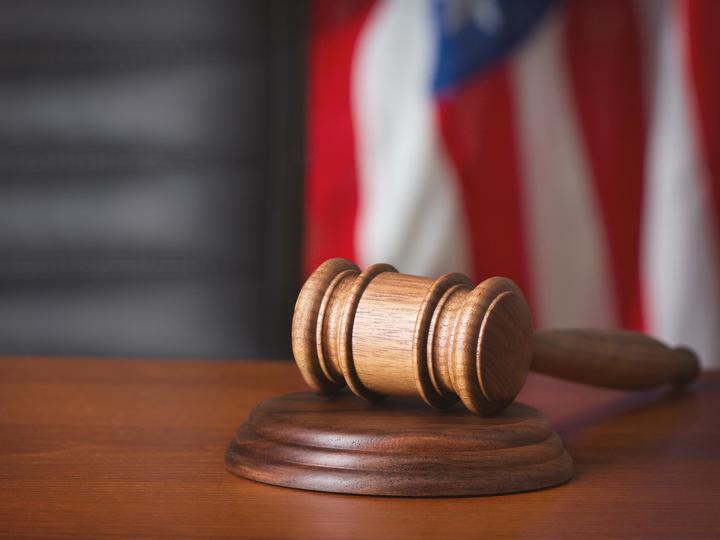 Gavel with an American flag in the background